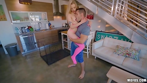 Sexy chick fucks in the kitchen